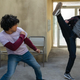Robby and Miguel fighting.